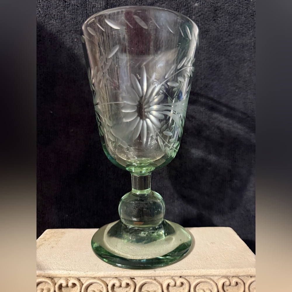 Green glass etched with daisies. 6.5”H. 10oz